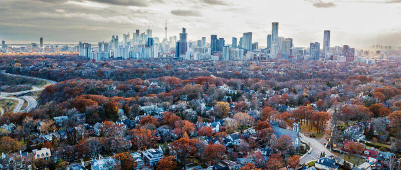 Arial view of Toronto suburbs and downtown in the distance